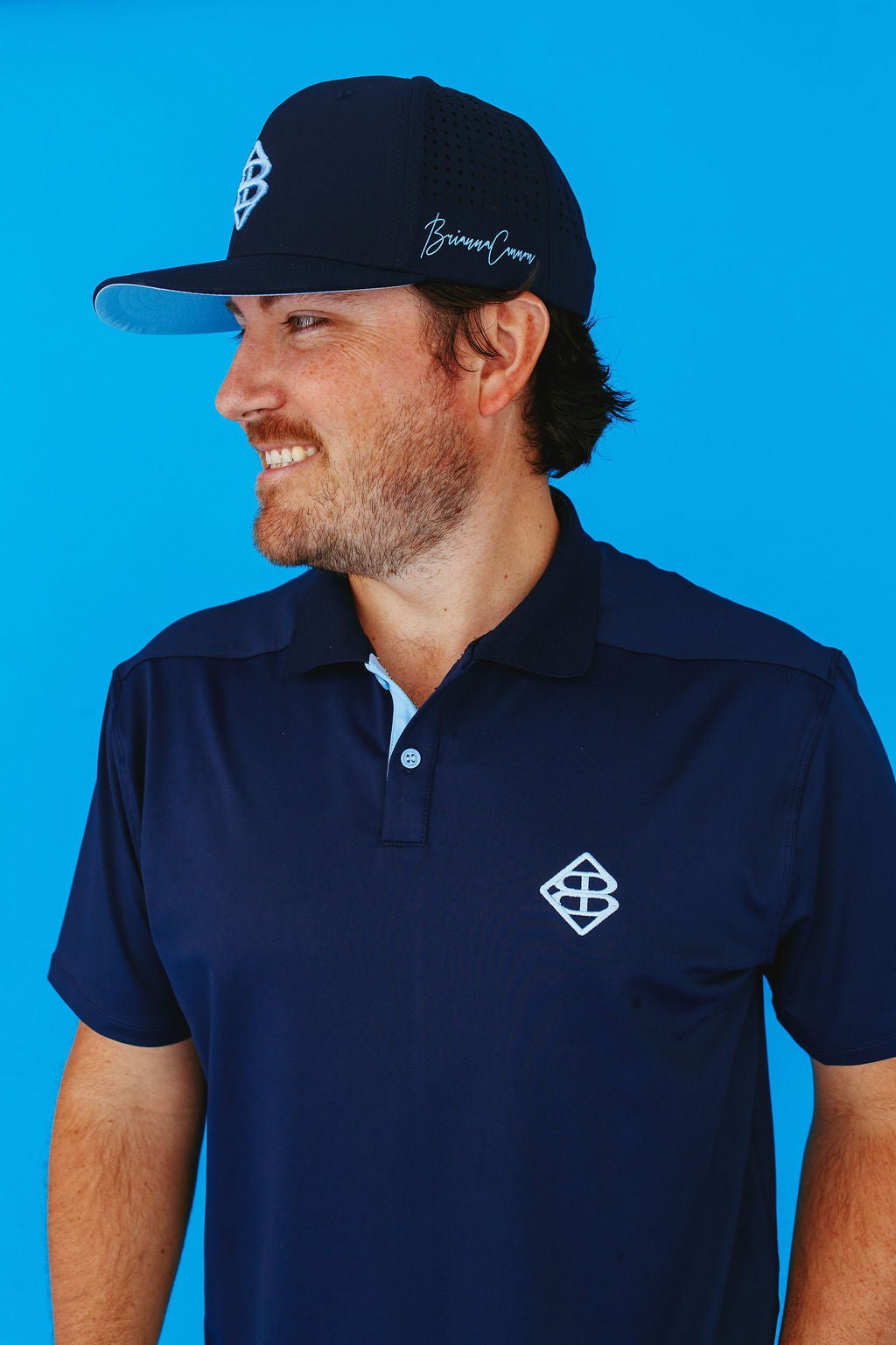Brianna Cannon - BC Men’s Navy and Columbia Blue Golf Polo